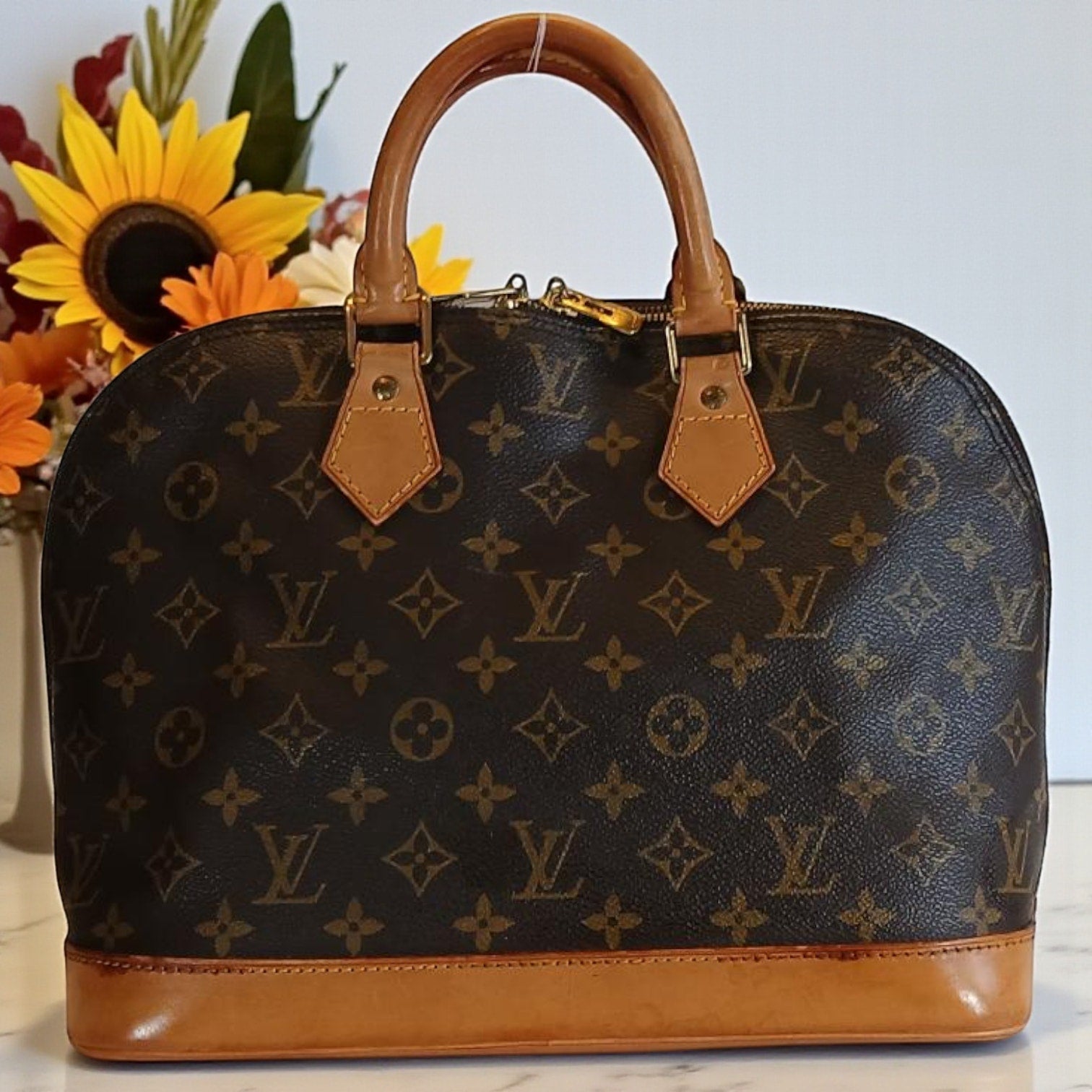 Louis Vuitton Alma PM Monogram Handbag - Vintage Authentic